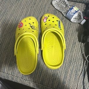 Yellow crocs with crams
